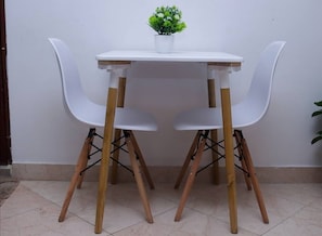 Comfort Studio, City View | Living area | 24-inch Smart TV with digital channels - Lux Suites Carina Studio Apartments (Mombasa)