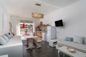 Honeymoon Quadruple Room, Patio, Sea View | In-room safe, individually decorated, individually furnished - FANI DREAM SUITE 2&3 By Vilos Suites (Milos)