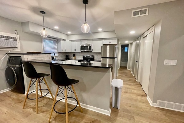 Grab a seat, make a meal, handle laundry. Your efficient space.