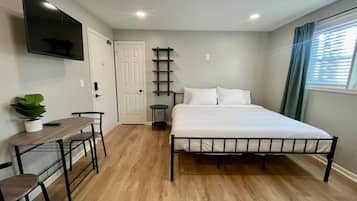 1 habitación, tabla de planchar con plancha, wifi y ropa de cama