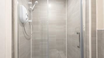 Shower, towels, shampoo