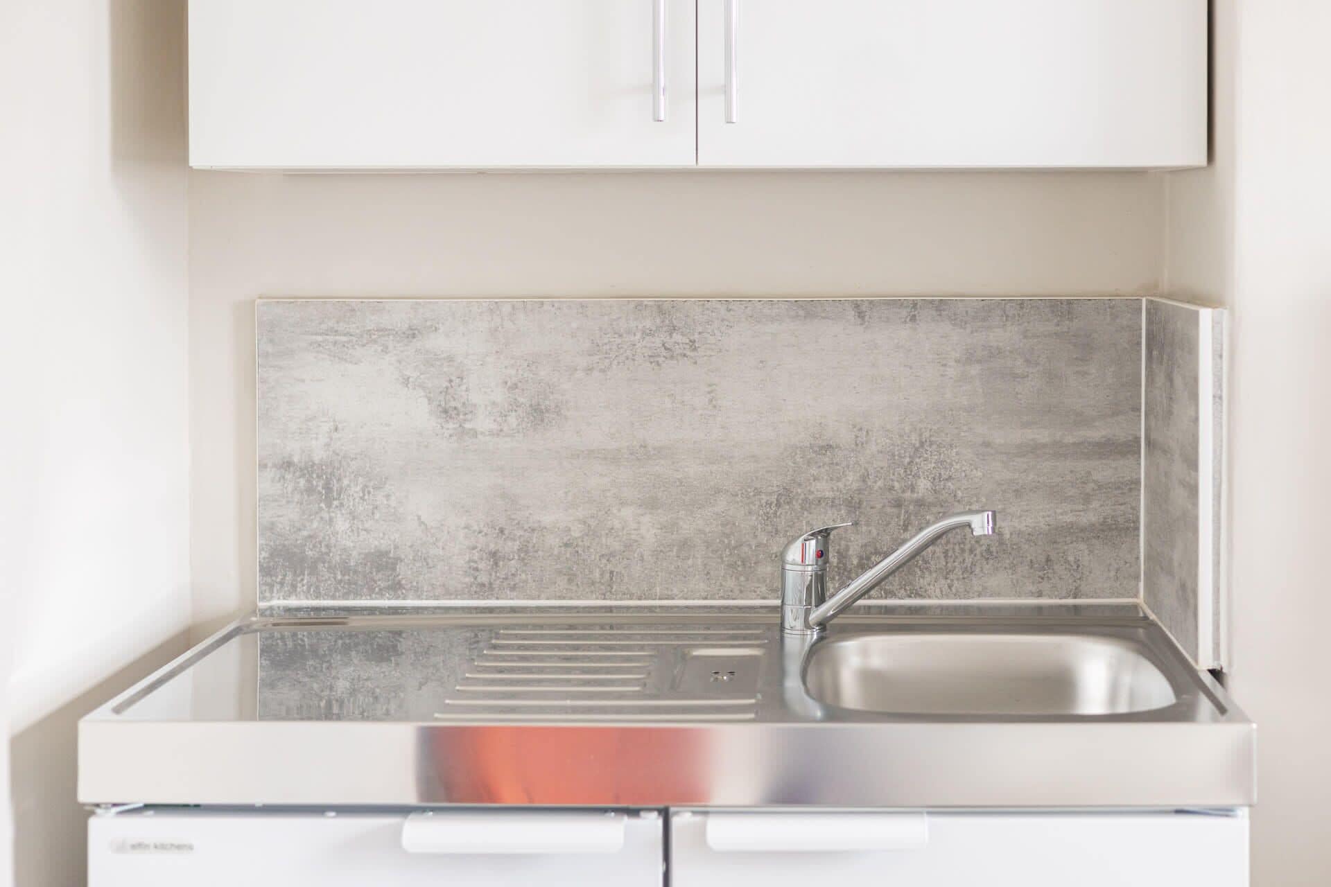 Fridge, microwave, electric kettle, cookware/dishes/utensils