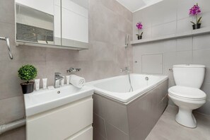 Shower, hair dryer, towels, shampoo