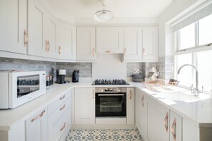 Fridge, microwave, oven, coffee/tea maker