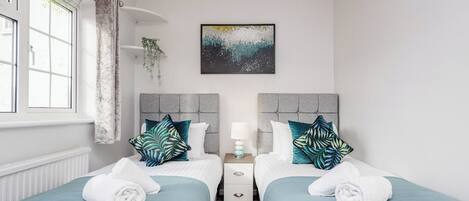 4 bedrooms, desk, iron/ironing board, travel cot