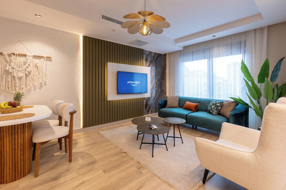 Suite Deluxe, balcón | 4 habitaciones y ropa de cama de alta calidad