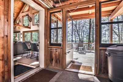 Private lakeside cabin on the shore of Virgin Lake with a large deck and firepit