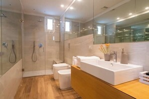 Shower, jetted tub, hair dryer, bidet