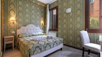 Deluxe Single Room, City View | Desk, laptop workspace, WiFi (free), bed sheets