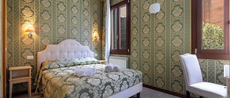 Desk, laptop workspace, free WiFi, bed sheets