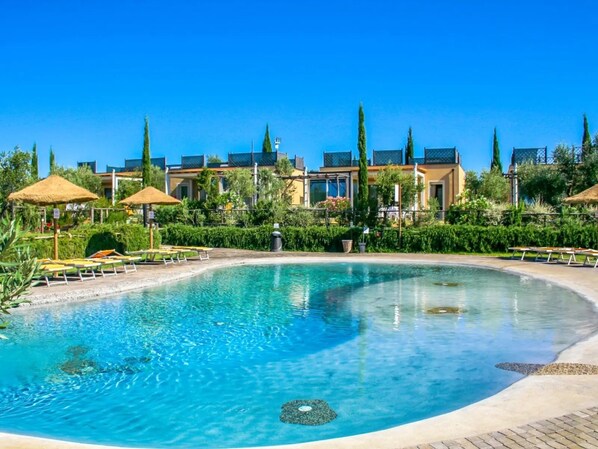 Seasonal outdoor pool, pool umbrellas, pool loungers