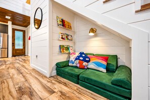 Adorable reading nook in the living area for kids