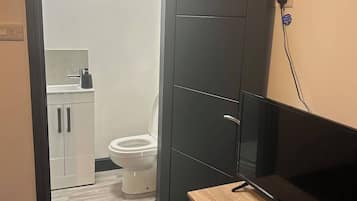 Shower, towels, soap, shampoo