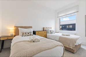 3 bedrooms, desk, iron/ironing board, travel cot