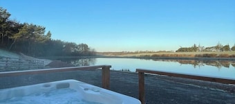 Larch Lodge - Idyllically situated Lakeside & private hot tub fishing riding