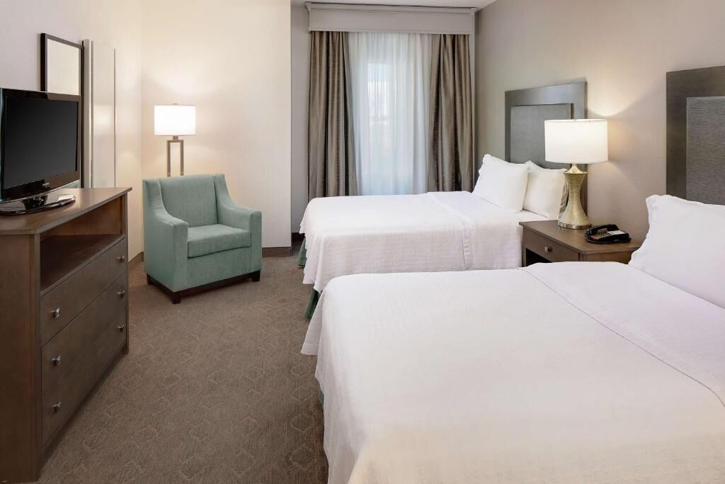2 Suites | 2 Double Beds w/ Separate Bedroom and Living Area