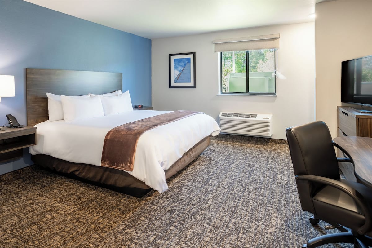 Premium bedding, pillow-top beds, desk, blackout curtains