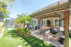 Outdoor dining - Not Your Average Pool Home At The Beach! Amenities Galore! Walk to the beach!  (St. Augustine)