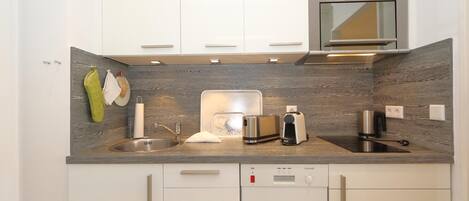 Fridge, microwave, coffee/tea maker, toaster