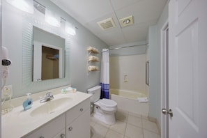 Hair dryer, towels, soap, toilet paper