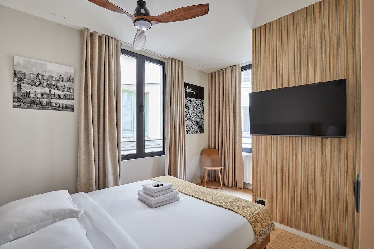 2 slaapkamers, een strijkplank/strijkijzer, gratis wifi, beddengoed