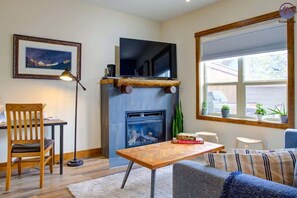 TV, fireplace, offices - Fire Mountain Two Bedroom Condo (Canmore)