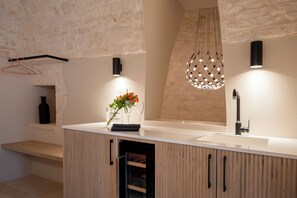 Luxury Suite, 1 King Bed | Living area | 50-inch Smart TV with digital channels, fireplace