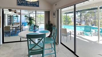 House, Multiple Beds, Pool Access, Pool View (Tropical Breeze Dockside Oasis) | Dining