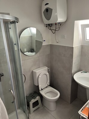 Hair dryer, towels, soap, toilet paper