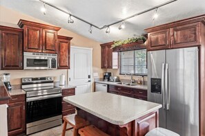 Fridge, microwave, oven, stovetop - Charming Mountain Retreat with Enclosed Backyard and Artistic Flair (Millcreek)