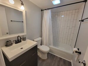 Hair dryer, towels, soap, toilet paper