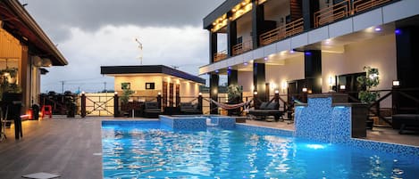Outdoor pool, cabanas (surcharge), pool umbrellas