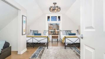 4 bedrooms, desk, iron/ironing board, travel crib