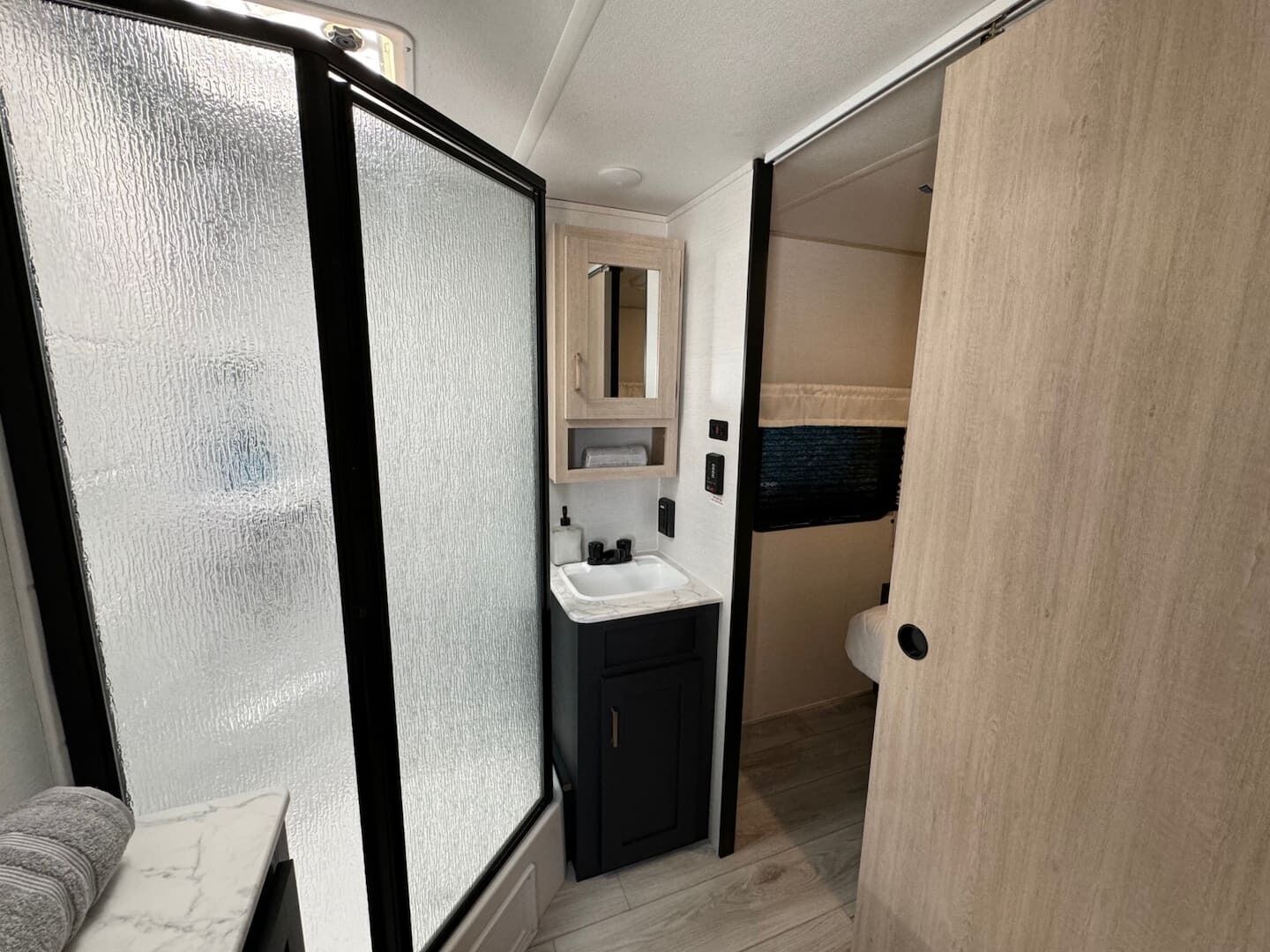 Shower, towels, soap, toilet paper