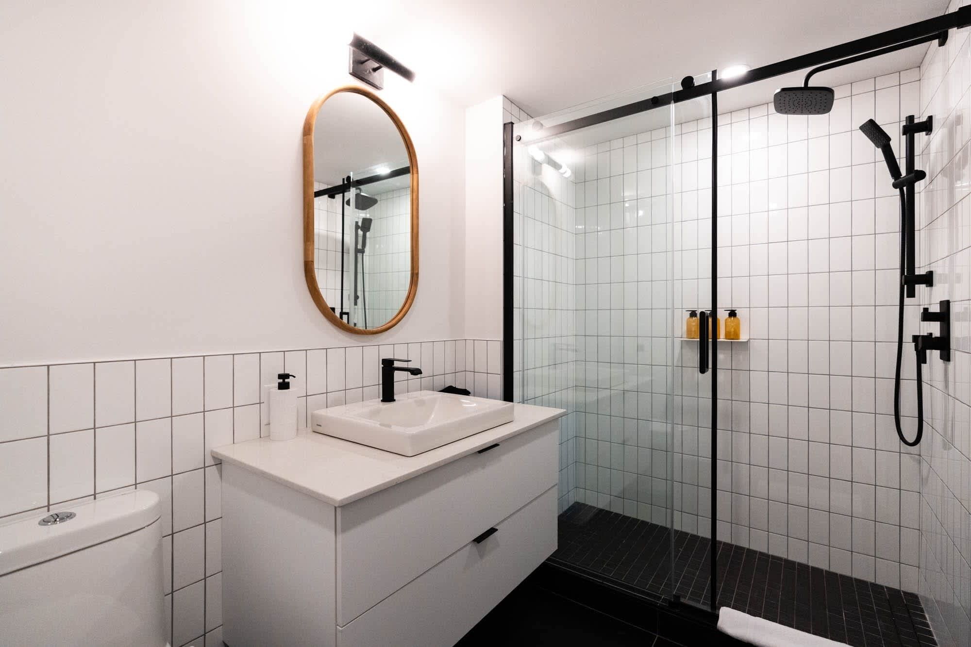 Shower, hair dryer, towels, shampoo