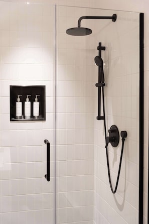 Shower, hair dryer, towels, shampoo