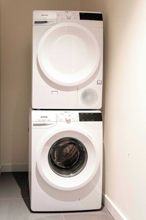 Convenient in-unit laundry facilities are available.