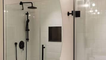 Shower, hair dryer, towels, shampoo