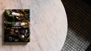A white marble table with a box of FORET guitar effects pedals. - Maison Place Royale • Luxury Two-Bedrooms Apartment • Old Montreal • Full Kitchen • Stone Walls • Wi-Fi • AC (Montréal)