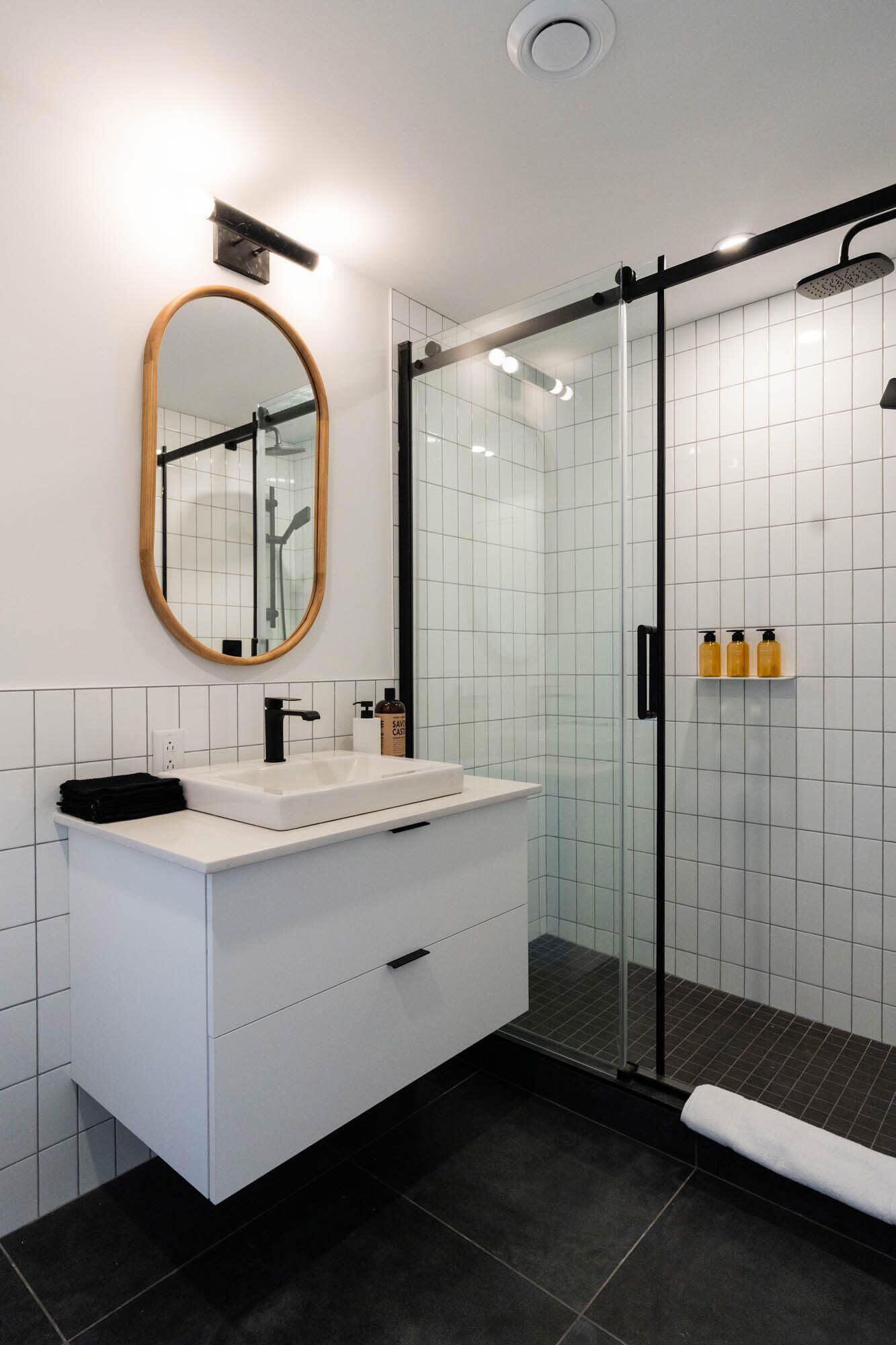 Shower, hair dryer, towels, shampoo
