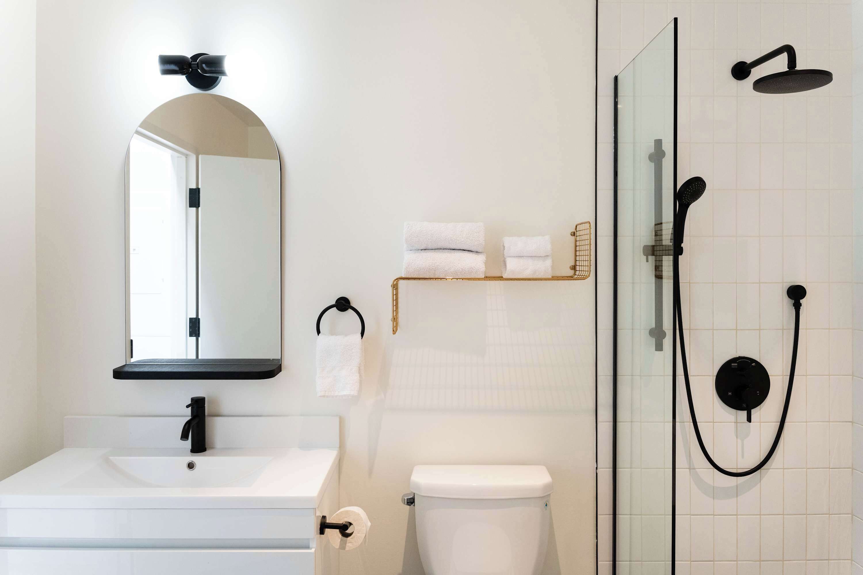 Shower, hair dryer, towels, shampoo