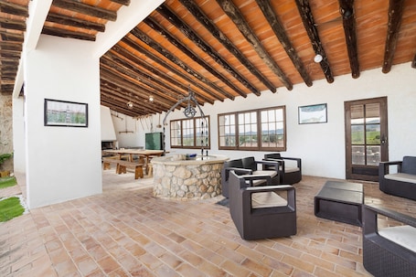 Outdoor dining. Country House 'Cal Eloi Janet' with Mountain Views, Private Pool and Wi-Fi