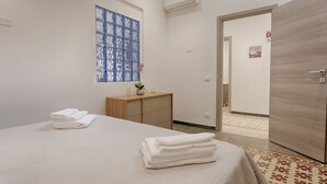 1 slaapkamer, een strijkplank/strijkijzer, wifi, beddengoed
