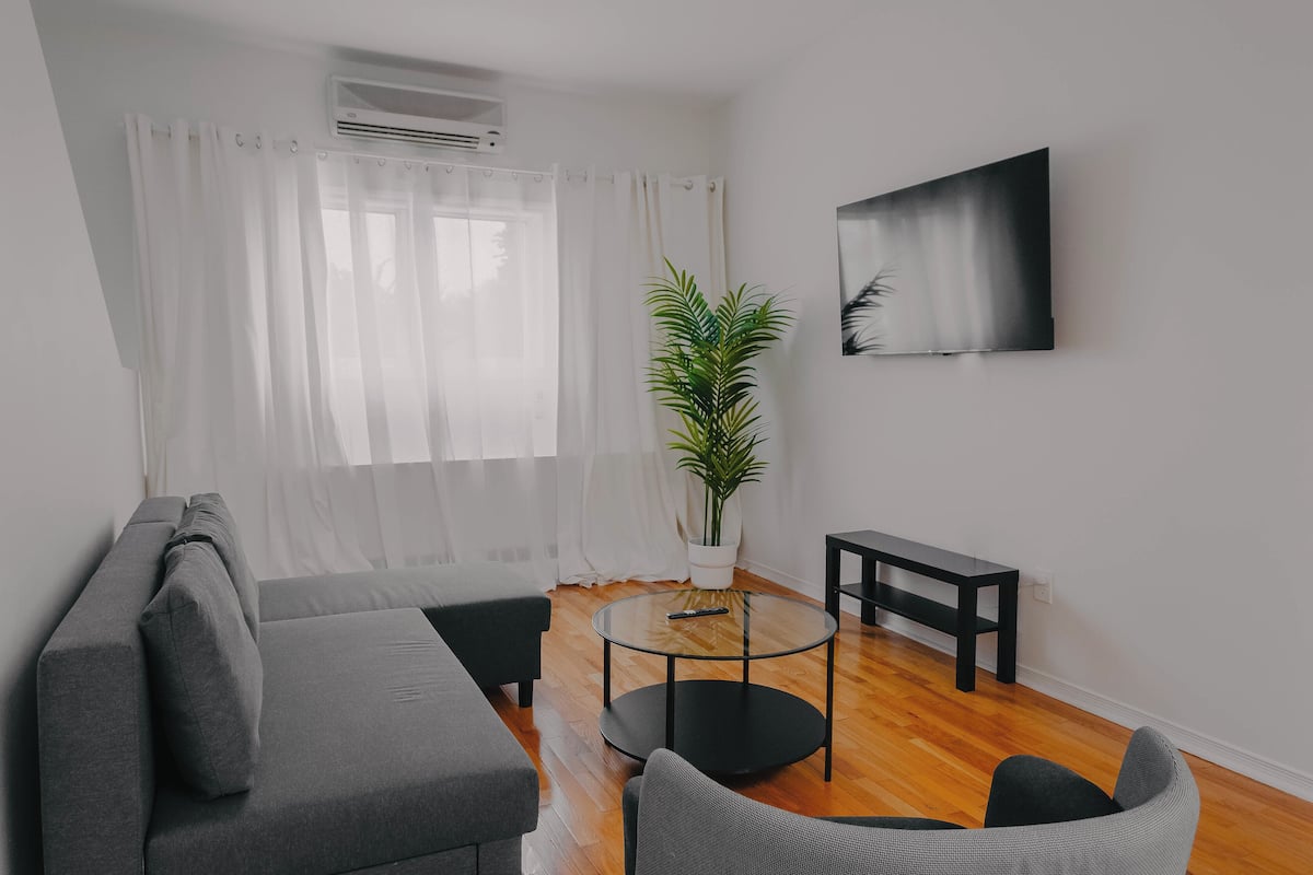 Suite Deluxe | Area soggiorno | Smart TV