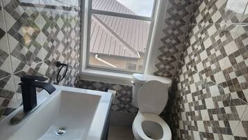 Shower, towels, soap, shampoo