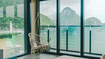 Premium bedding, free minibar items, desk, laptop workspace