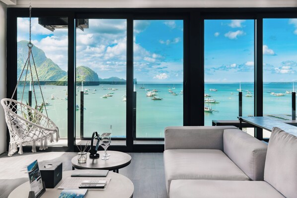 Presidential Suite, Balcony, Bay View | Living area | 55-inch Smart TV with digital channels, Netflix, streaming services - H Hotel El Nido - Vegan Friendly Hotel (El Nido)