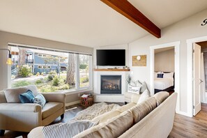 TV, fireplace - Family-friendly, soundfront getaway with deck, Wifi, W/D and mountain views (Fox Island)