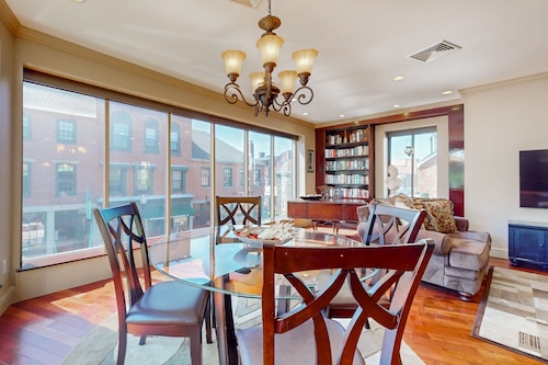 Centrally located open concept apartment with parking,  central AC, & W/D