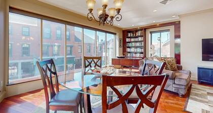 Centrally located open concept apartment with parking, central AC, & W/D